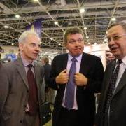<div style="font-weight:normal"><b>Система ЧПУ FLEX&nbsp;NC</b> / <b>В.П.&nbsp;Гапонцев</b>, к.т.н., управляющий директор и член правления директоров IPG&nbsp;Photonics (справа);&nbsp; <b>С.Н.&nbsp;Чижиков</b>, вице-президент Машиностроительного дивизиона ГК «Бородино» (в центре);&nbsp; <b>А.П.&nbsp;Рыбалко</b>, к.т.н., генеральный директор Станкоцентр (слева)</div>